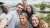 Students smiling taking a group photo